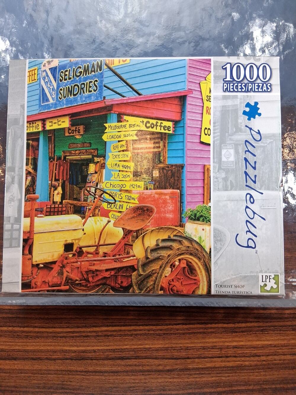 Puzzelbug "Tourist Shop" 1000pc Puzzle 10 & Up Tractor Signs Visitors Vaca Fun